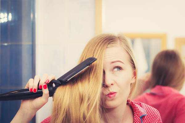 Capelli danneggiati piastra